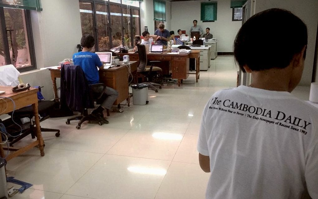 Journalists working on the final issue of the Cambodia Daily in the newsroom in Phnom Penh on September 3, 2017 (Ananth Baliga)